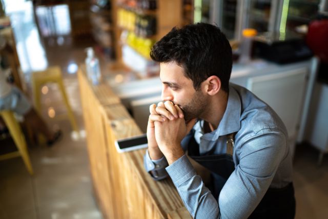 Man looking worried at work