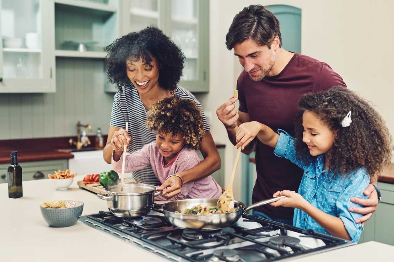 Family cooking dinner together