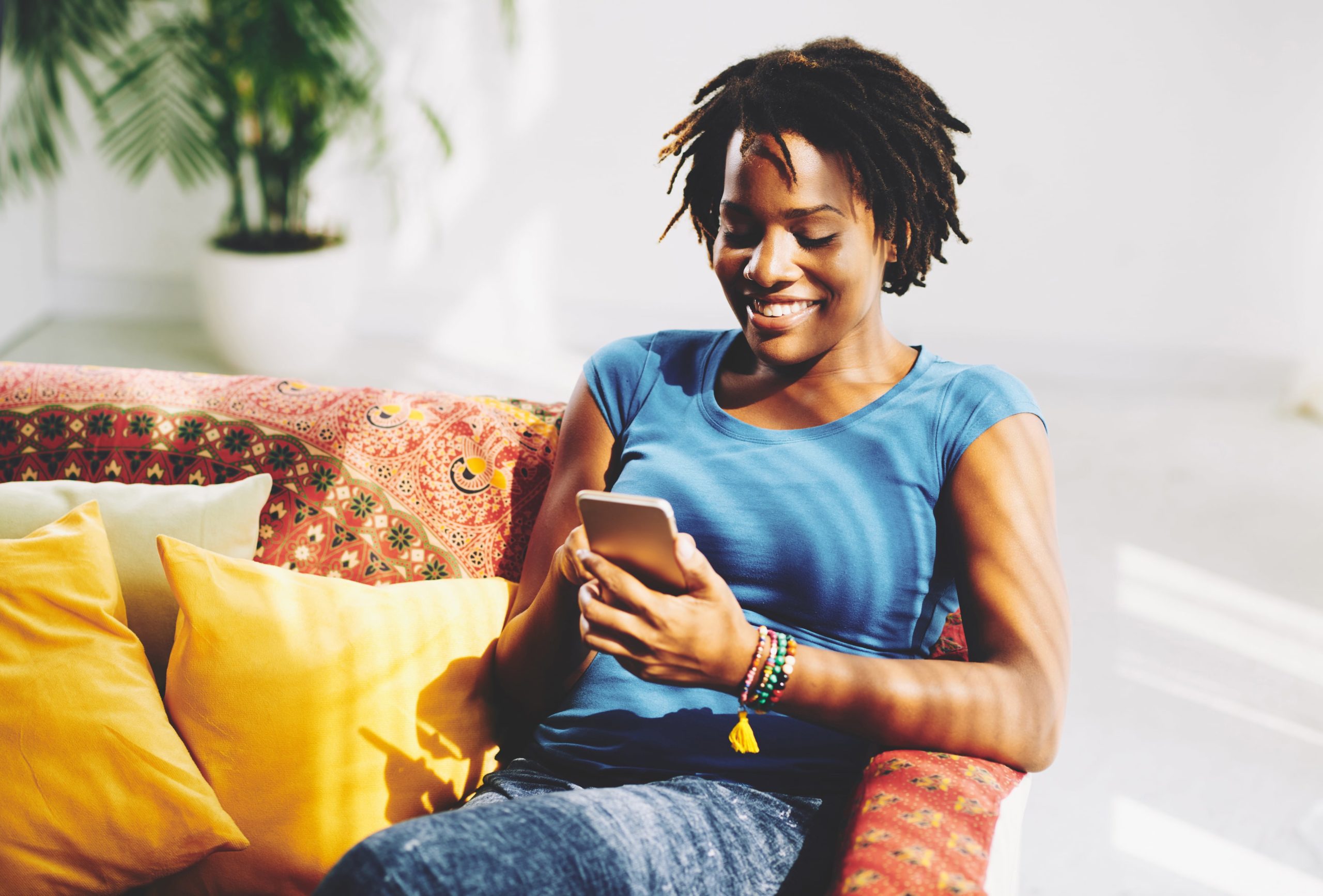 Woman viewing LegalShield benefits on cellphone