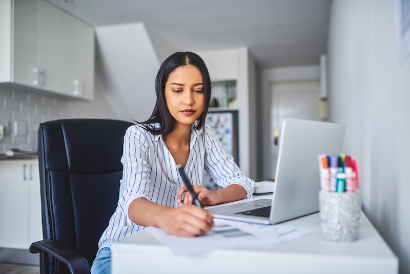 Woman making comments on document