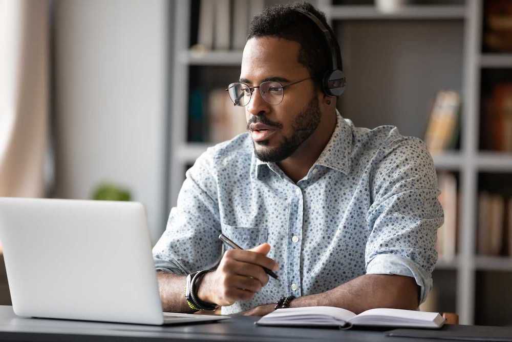 Man looking a laptop