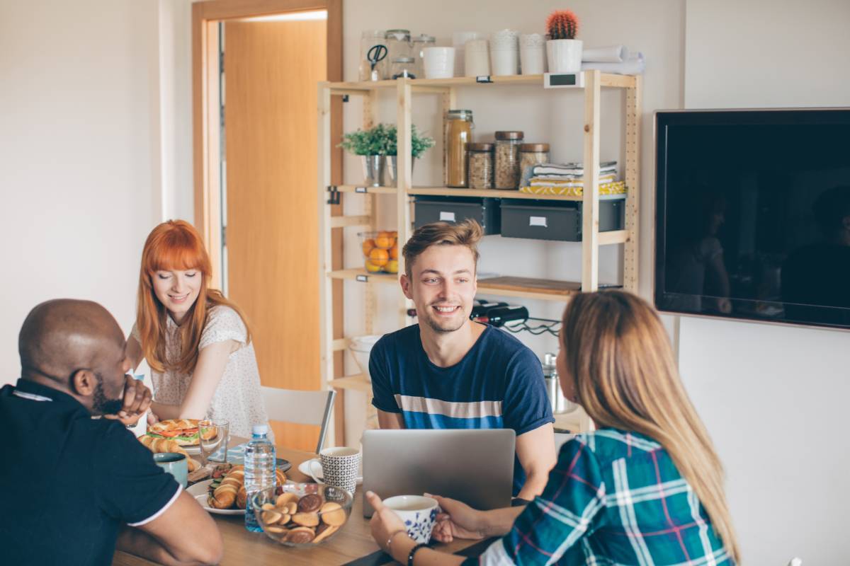 Roommates eating and talking