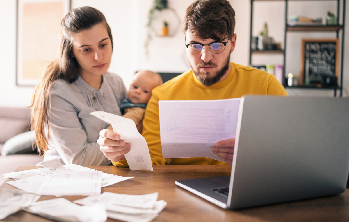 Parents working on filing taxes