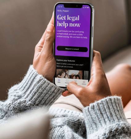 Woman viewing the LegalShield app on her phone.