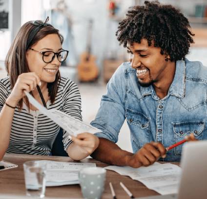  Couple discussing the need for a Living Will vs a Trust