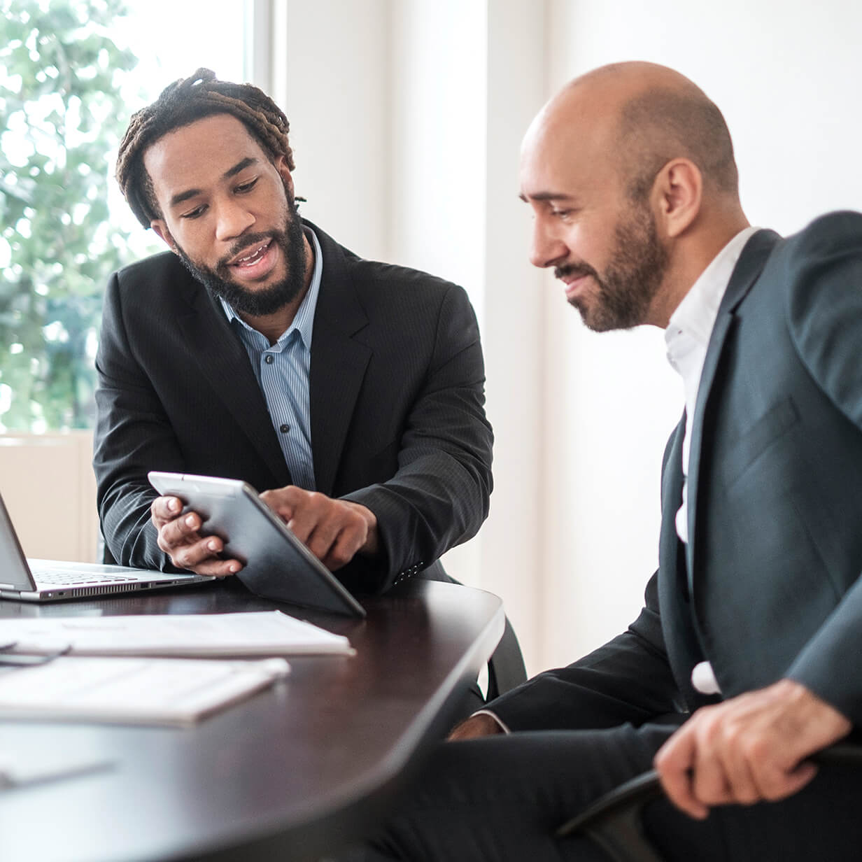 Lawyer discussing a DBA with a small business owner.