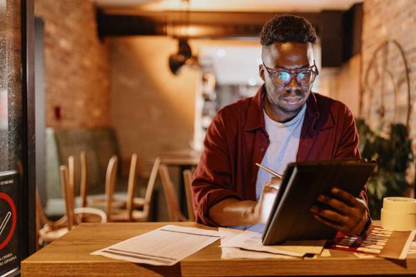 Small business owner working on his taxes.